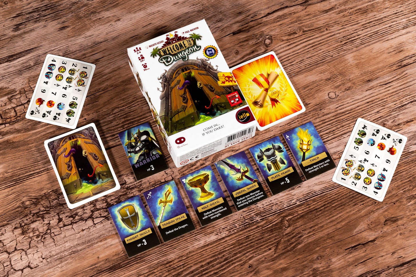 Cards and the box for Welcome to the Dungeon