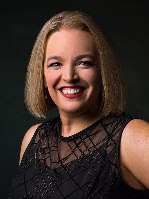 Auctioneer Kelly Russell headshot photos