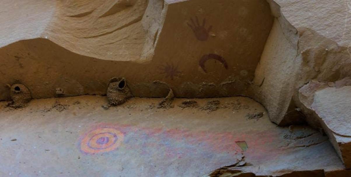 A rock wall with drawings on it
AI-generated content may be incorrect. A rock wall with drawings on it
AI-generated content may be incorrect.