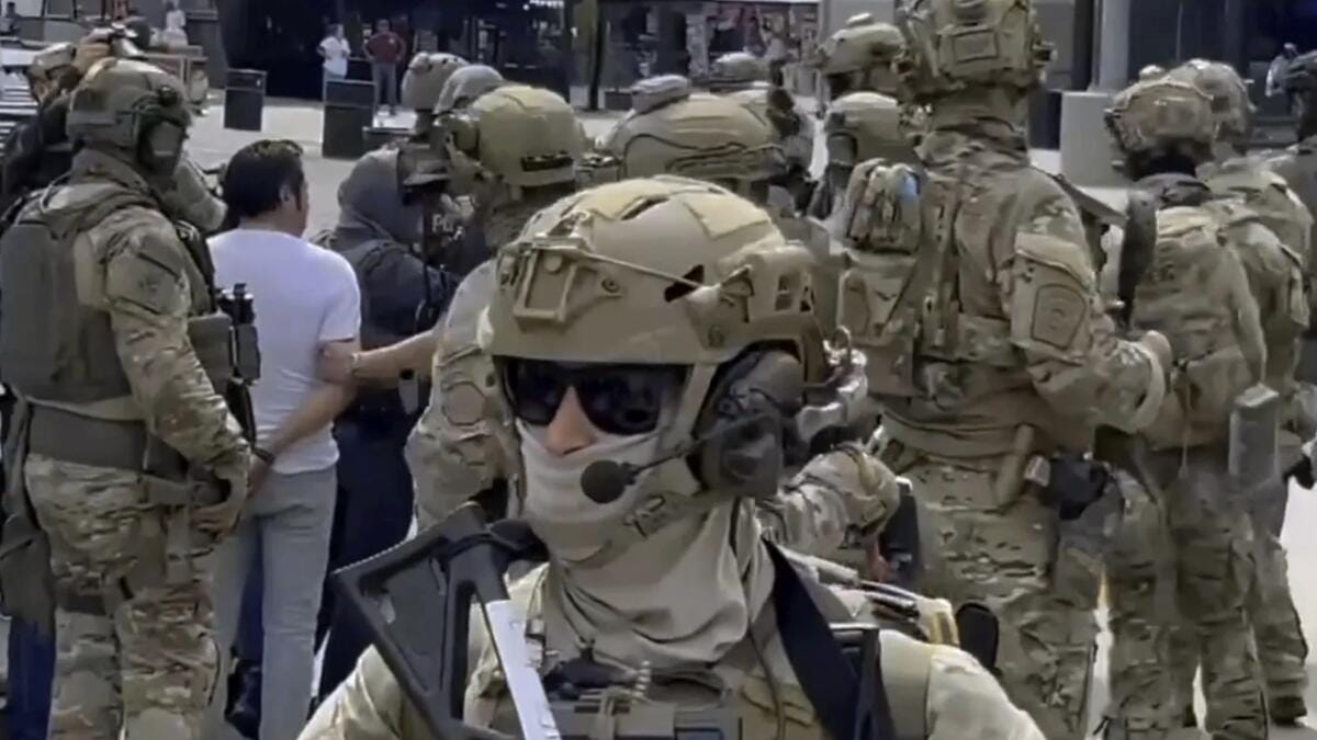 Want to protect officers — and our democracy? Ban masks - Los Angeles Times