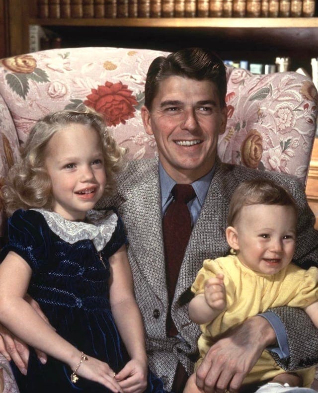 Ronald Reagan with his daughter Maureen and adopted son Michael in 1945 ...