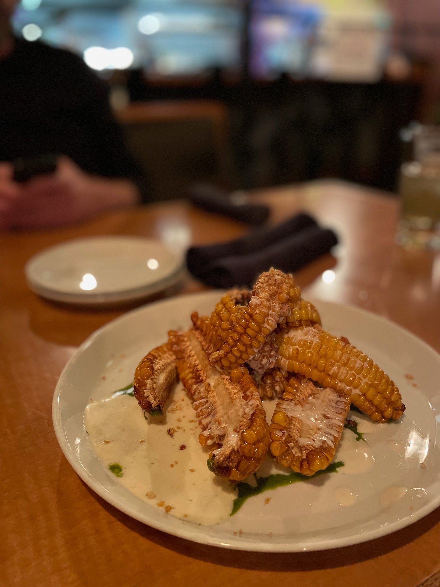 Corn in a sauce on a plate Corn in a sauce on a plate