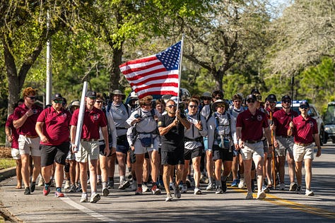 Troy University’s chapter of Alpha Tau Omega finished their 128.3-mile walk from the Troy quad to Panama City Beach on Wednesday. The fraternity raised $140,000 for Jeep Sullivan’s Wounded Warrior Outdoor Adventures. (PHOTO/Joey Meredith)
