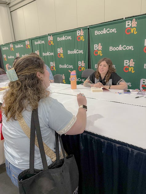 Casey McQuiston and fan