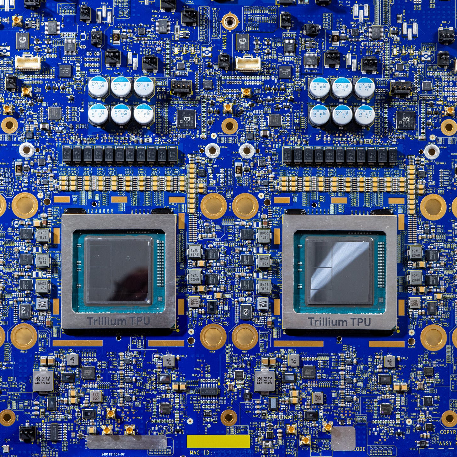 An array of computer chips against a blue motherboard.