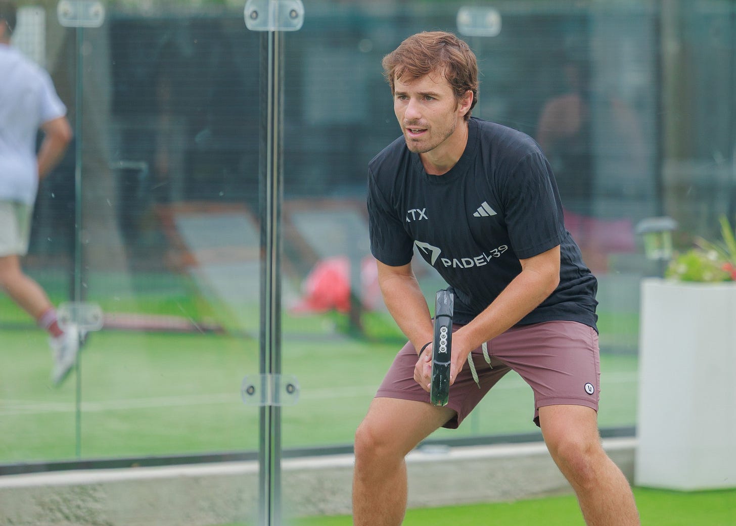 Padel39 founder Will Boyce on a padel court Padel39 founder Will Boyce on a padel court