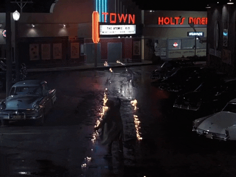 Doc Brown celebrates after he successfully sends Marty McFly and the DeLorean back to 1985. Doc Brown celebrates after he successfully sends Marty McFly and the DeLorean back to 1985.
