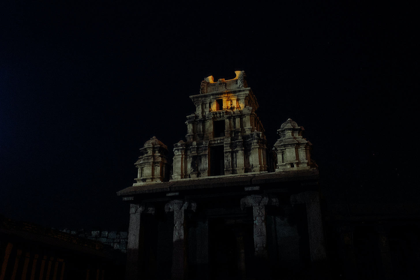 A photo of a spooky mansion at night.