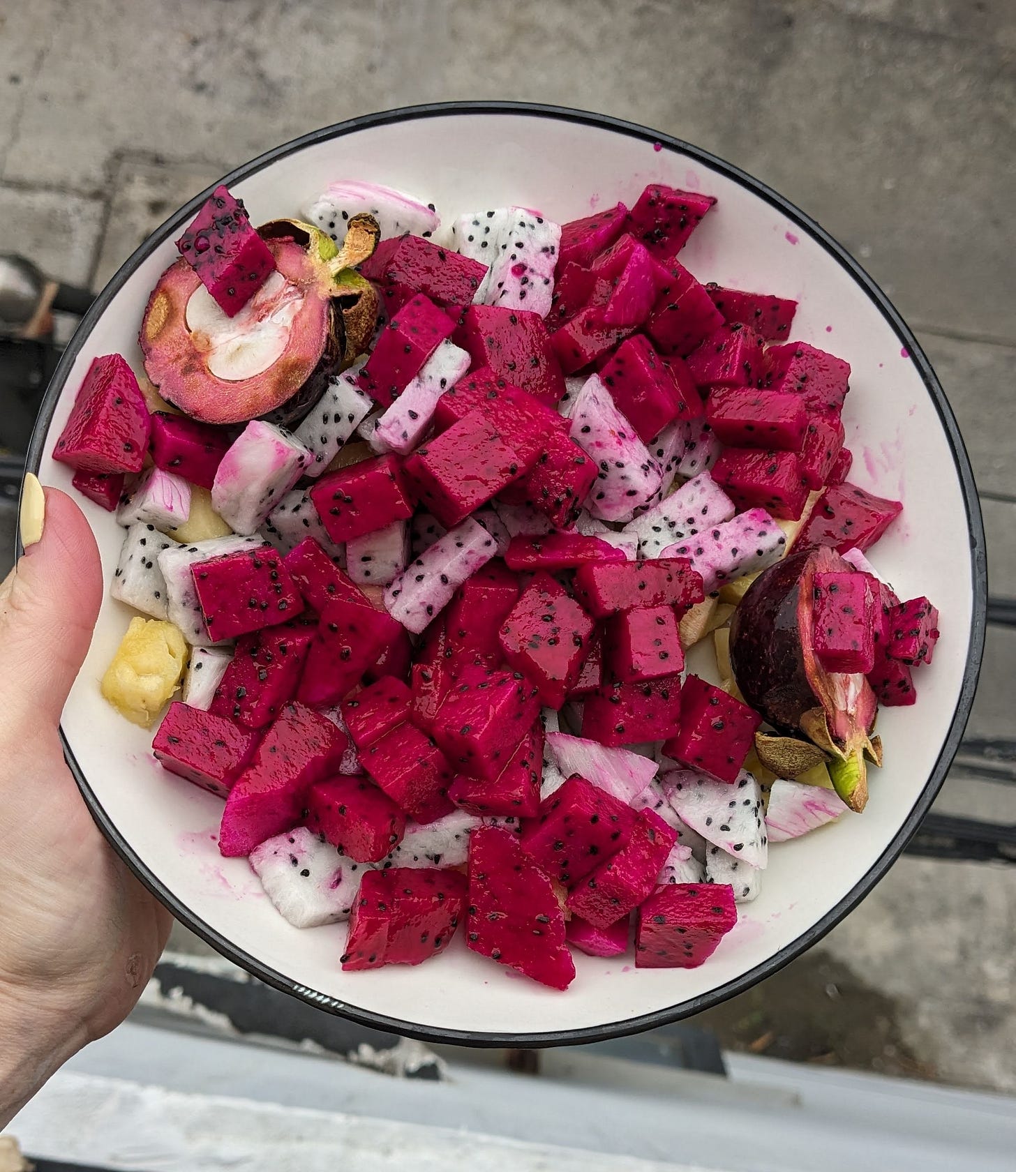 plate of cut red and white seeded dragonfruit