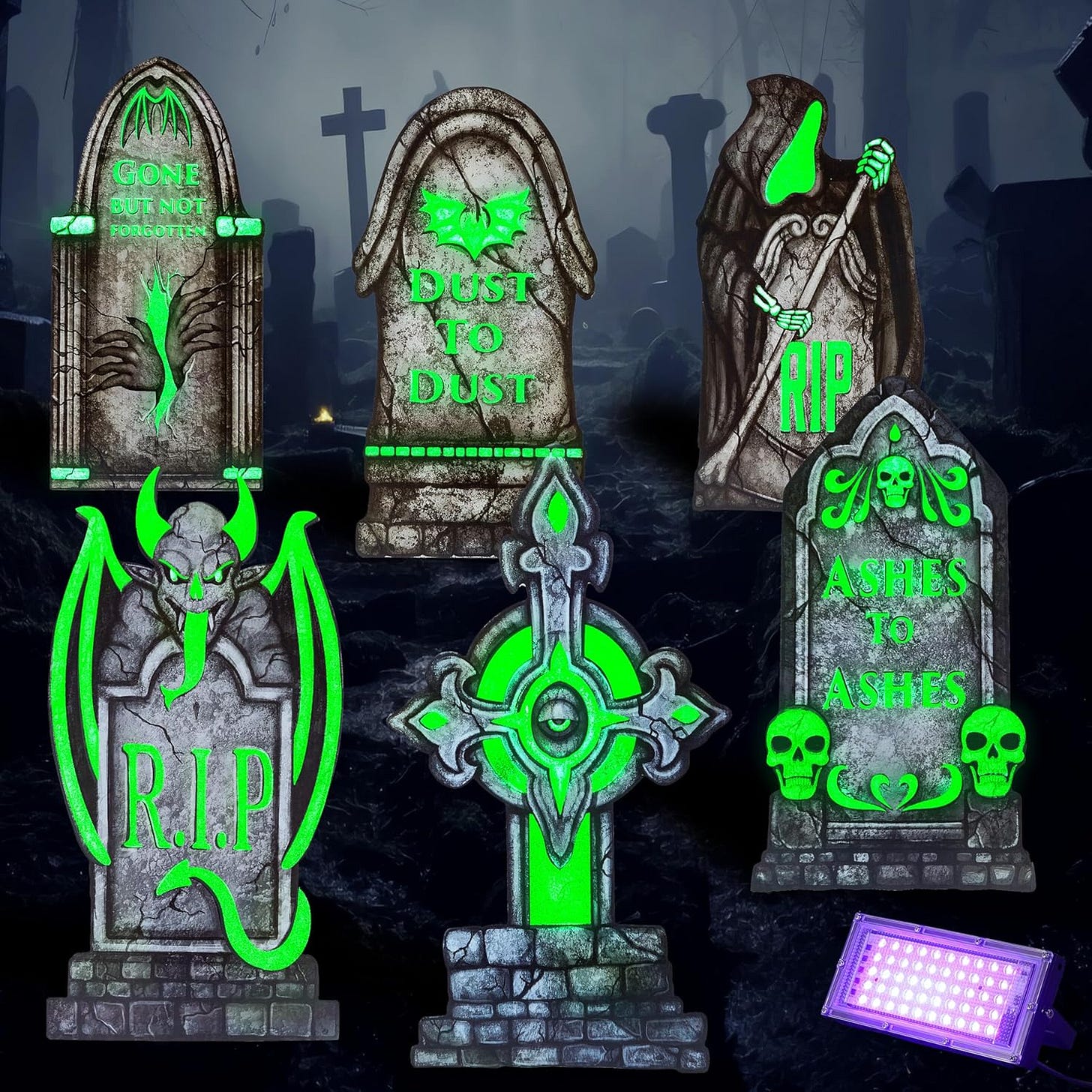 Halloween tombstone decorations with glowing green sections.