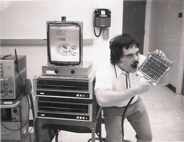 r/OldSchoolCool - Alan Kay With the First Xerox Alto Unit, Taking a Byte With His Good Friend Cookie Monster (1970s)