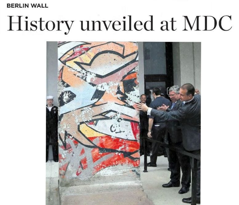 Figure 6: The Berlin Wall segment on Miami-Dade College’s downtown campus on November 9, 2014, during the dedication. Courtesy of the Miami Herald, photographer Carl Juste. Figure 6: The Berlin Wall segment on Miami-Dade College’s downtown campus on November 9, 2014, during the dedication. Courtesy of the Miami Herald, photographer Carl Juste.