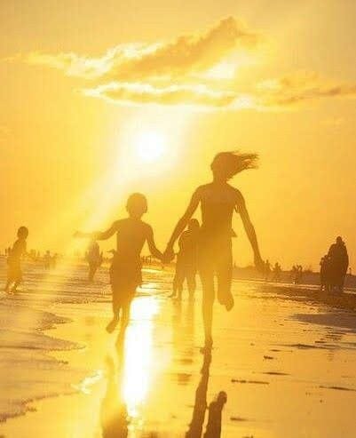 May be an image of child, ocean and beach