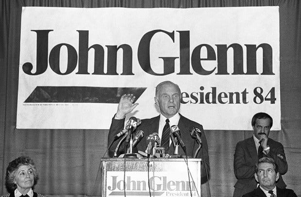 Sen. John Glenn, D-Ohio, answers questions from the press in Jackson, Miss., on Jan. 18, 1984, during his run for the Democratic presidential nomination. Glenn died Thursday at the age of 95.