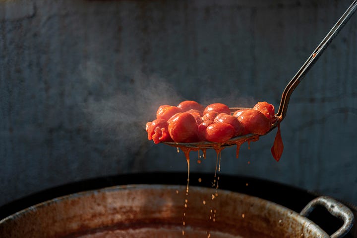 Typing on a laptop and cooking tomatoes. Photos by Francesco Pinto and Christin Hume via Unsplash.