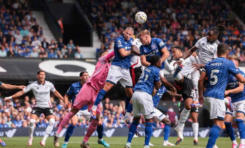 Ipswich clear a corner, Kalvin Phillips is trying to head the ball with his eyes closed