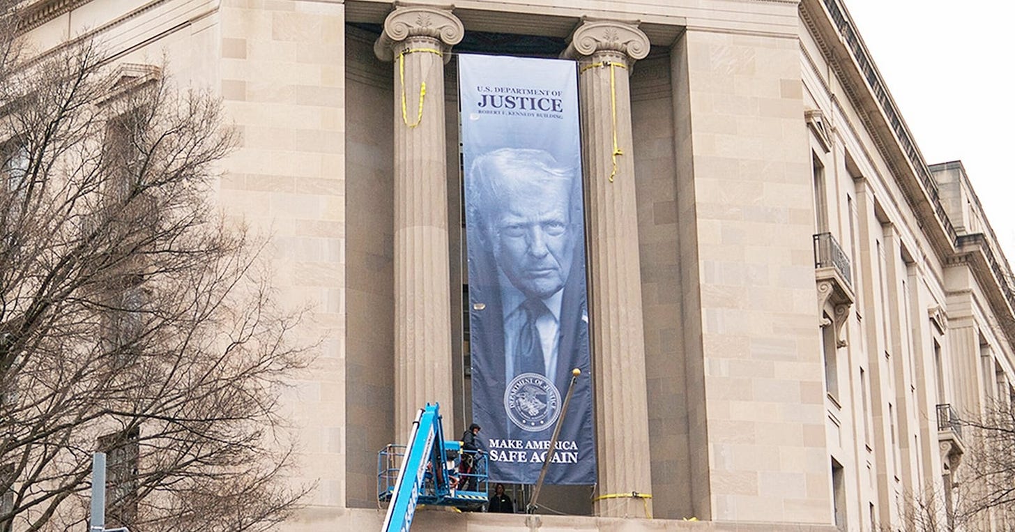Convicted Felon's Face Plastered on DOJ Building