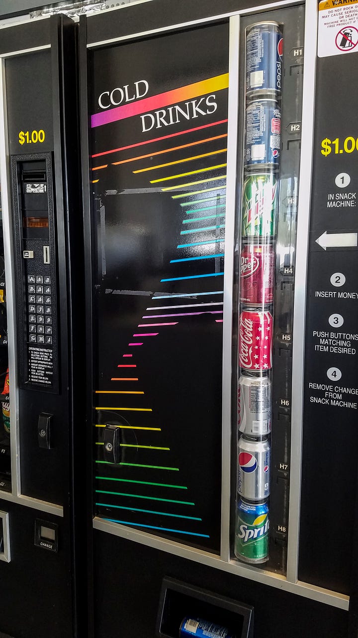 Two photos. Photo of a soda machine. The main panel is black with bright, horizontal, neon strips (in the colors of the rainbow) running across the panel. There are two large black areas in the shape of soda cans. The sodas available are displayed to the right, in a tall, clear tube - Mountain Dew, Dr. Pepper, Coca Cola, Diet Coke, Pepsi - with prices alongside each can. 4 step instructions appear on the right. Photo of a white washing machine. It is a top load machine and the door is open. The coin feed is on the right. To the right of the washing machine is a white utility sink with a long neck faucet spout. Behind, on the wall is a rectangular white dispenser of "Soap / Bleach / Softeners". TO the right is a change machine. Between the two is a sign, "Management reserves right to refuse service to anyone" in all caps, red letters.