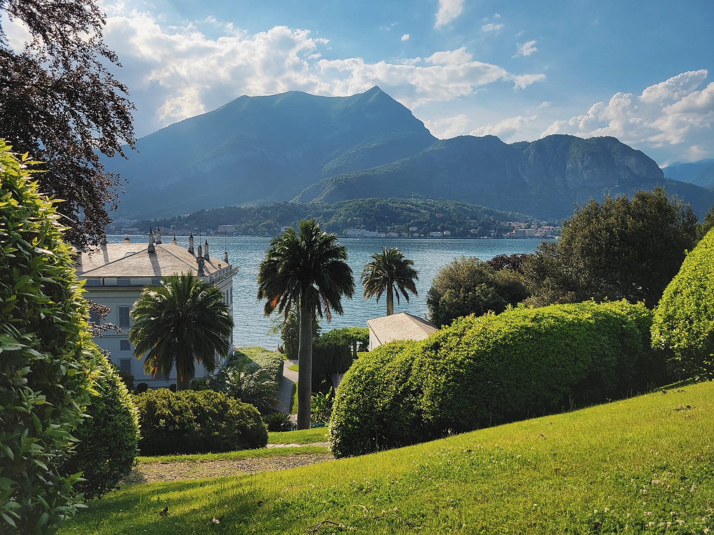 Green gardens overlooking Lake Como and the surrounding mountains Green gardens overlooking Lake Como and the surrounding mountains