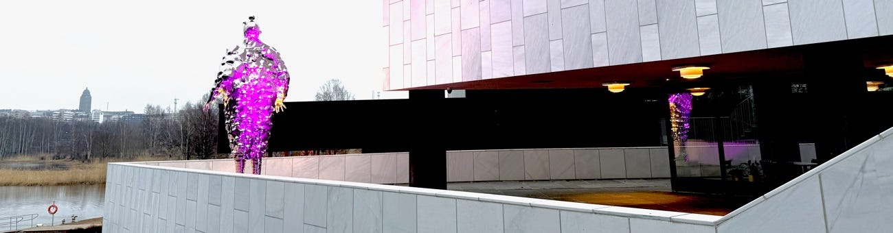 A white wall with a black and red wall

AI-generated content may be incorrect.
