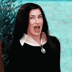 Agatha Harkness Playful Wink GIF | GIFDB.com