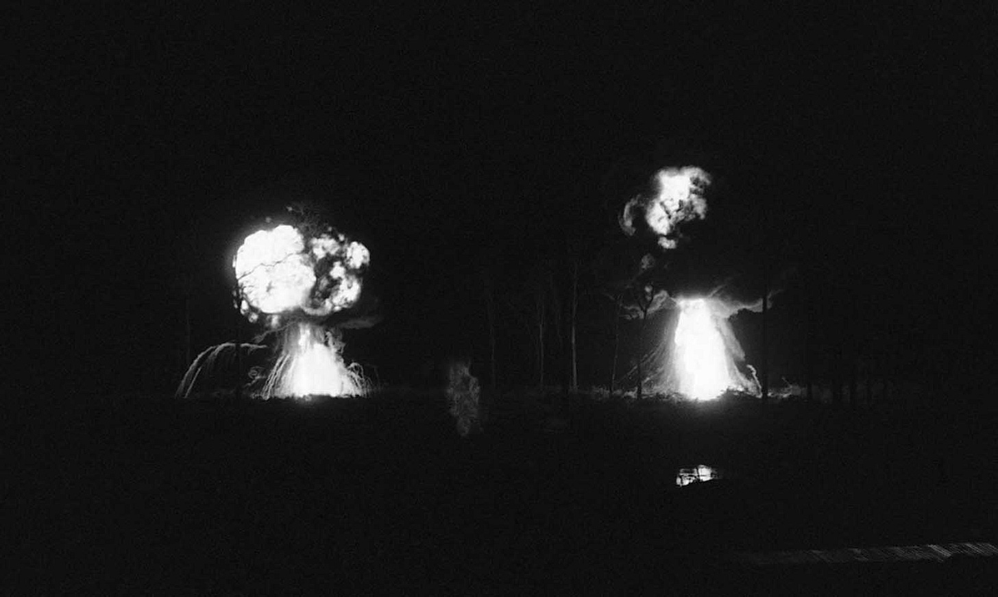August 28, 1968, Katum: Two napalm explosions erupt near a U.S. Special Forces camp northwest of Saigon, deployed against attacking Viet Cong forces. August 28, 1968, Katum: Two napalm explosions erupt near a U.S. Special Forces camp northwest of Saigon, deployed against attacking Viet Cong forces.