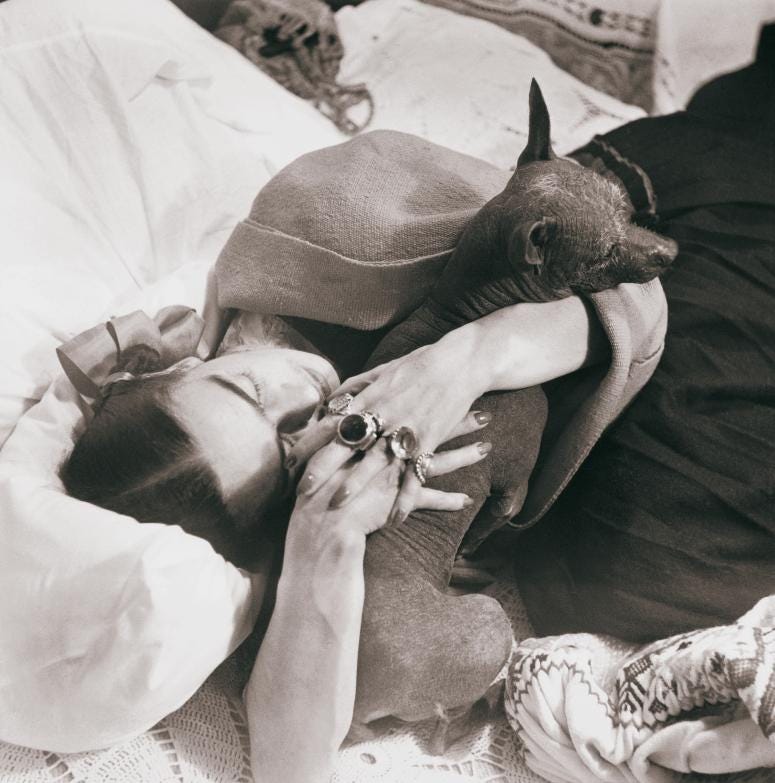 Frida Kahlo and her dog.