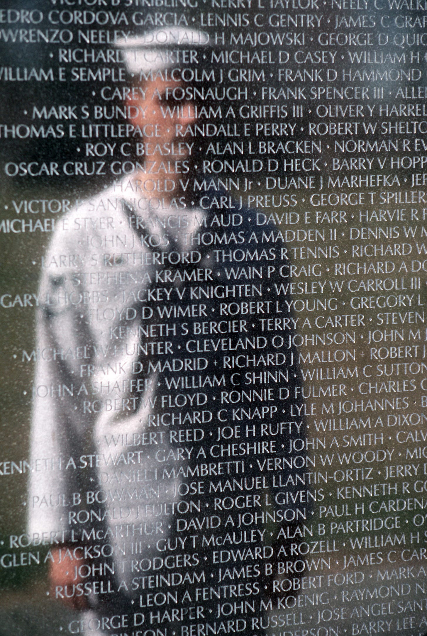 Sailor's Reflection on the Vietnam Veterans Memorial Washington, D.C., USA