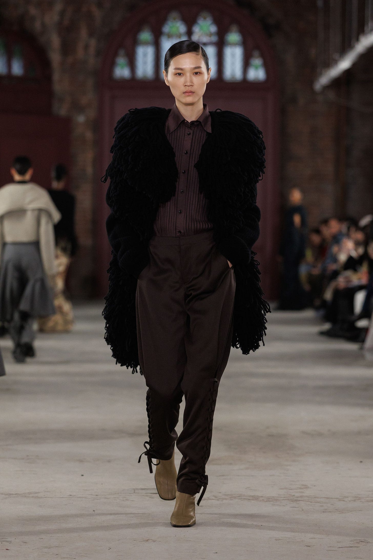 Image may contain Adult Person Clothing Coat and Fashion Image may contain Adult Person Clothing Coat and Fashion