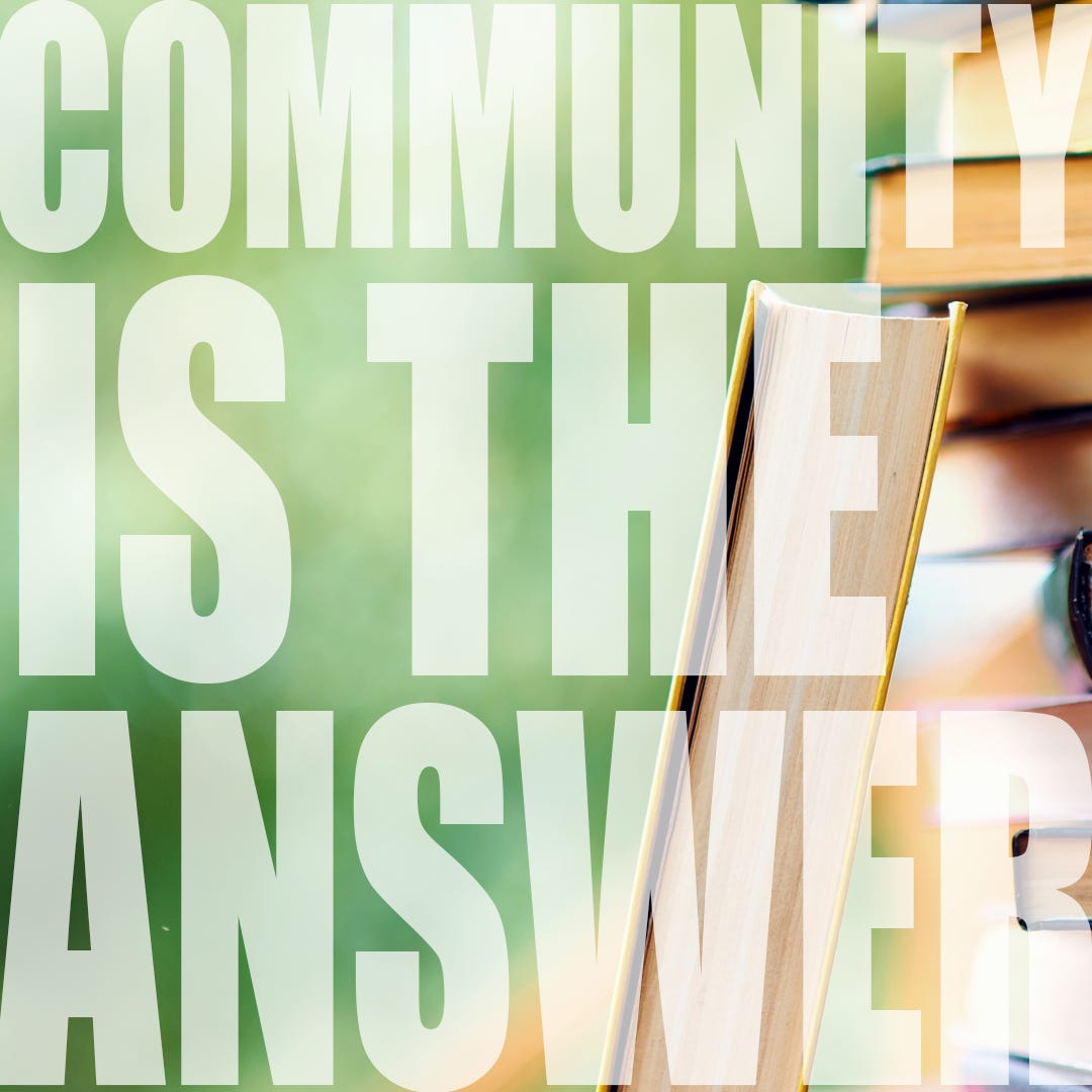 COMMUNITY IS THE ANSWER in large white capital letters, overlaid on a warm photo of books—an open book leaning upright against a stack of hardcovers, with a soft, sunlit green background.