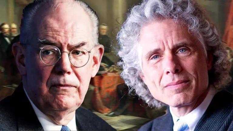 A person with grey hair and glasses

Description automatically generated