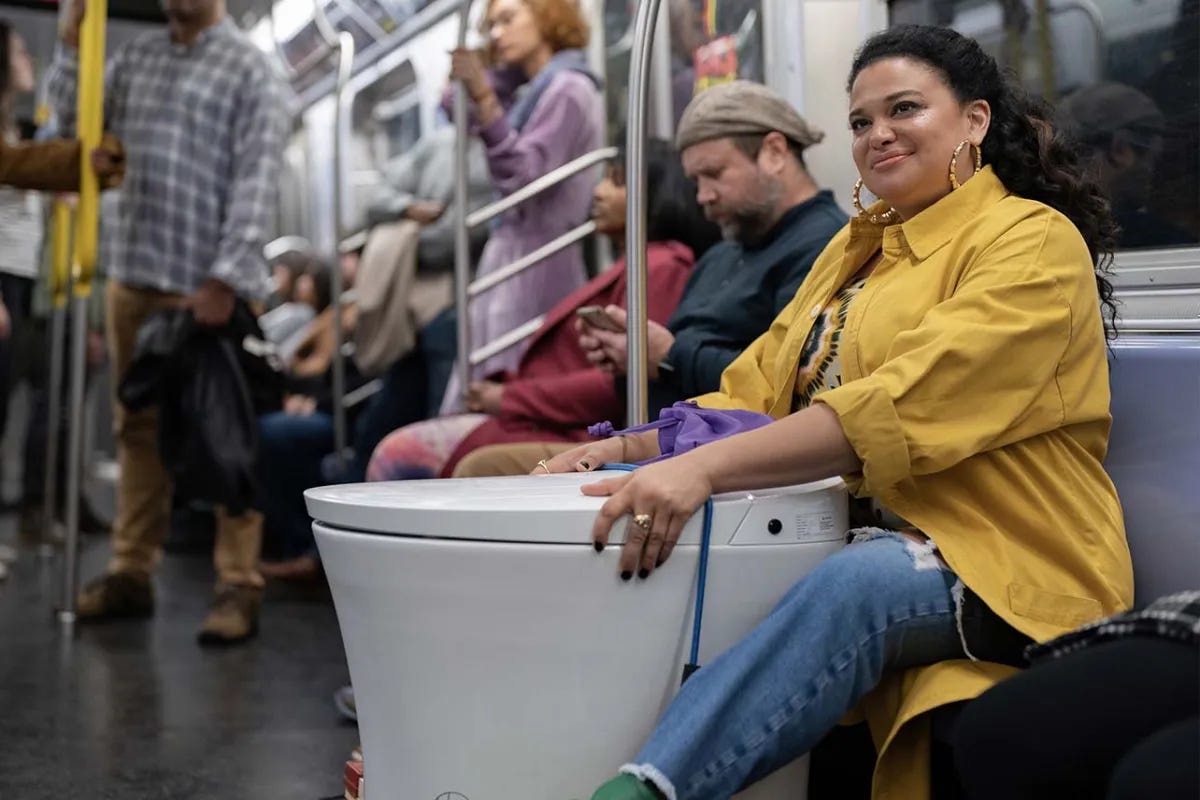 Mavis Beaumont takes her bidet toilet on the NYC subway in Survival of the Thickest.