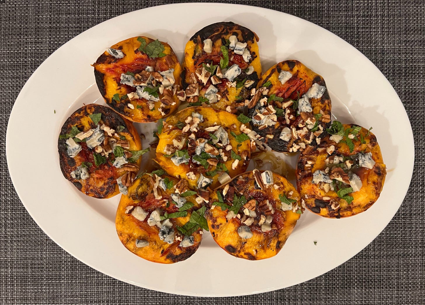 grilled peaches with gorgonzola, hazelnuts, mint, and hot honey