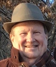 A person wearing a hat

Description automatically generated