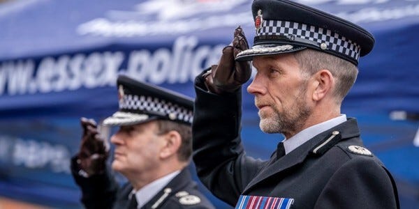 Chief Constable BJ Harrington and Assistant Chief Constable Kevin Baldwin saluting during a passing out parade