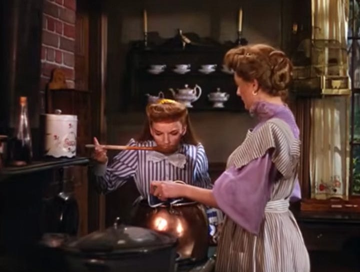 Judy Garland and others take a taste of homemade ketchup in the film Meet Me In St. Louis