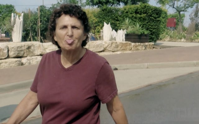 Kinneret Gat, 67, is seen sticking her tongue out at Hamas terrorists shortly before her murder during the terror group's October 7, 2023, assault on southern Israel, as seen in a Channel 12 documentary broadcast on September 26, 2024. (Screen capture via N12, used in accordance with Clause 27a of the Copyright Law)