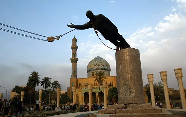 The iconic moment the statue of Saddam Hussein was toppled in Firdos Square, Baghdad, symbolizing the fall of his regime after the 2003 US invasion. The iconic moment the statue of Saddam Hussein was toppled in Firdos Square, Baghdad, symbolizing the fall of his regime after the 2003 US invasion.