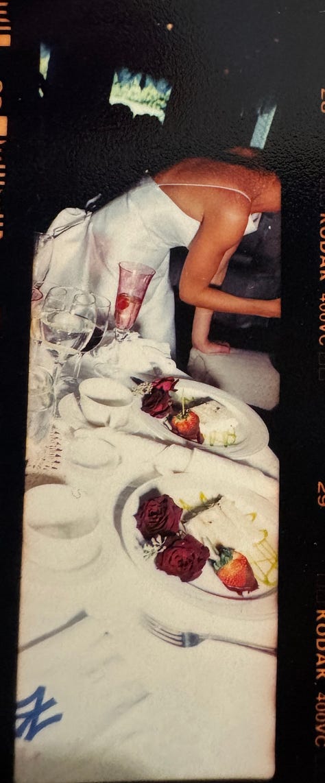 Analog photos of cakes at weddings by Angela Cappetta.