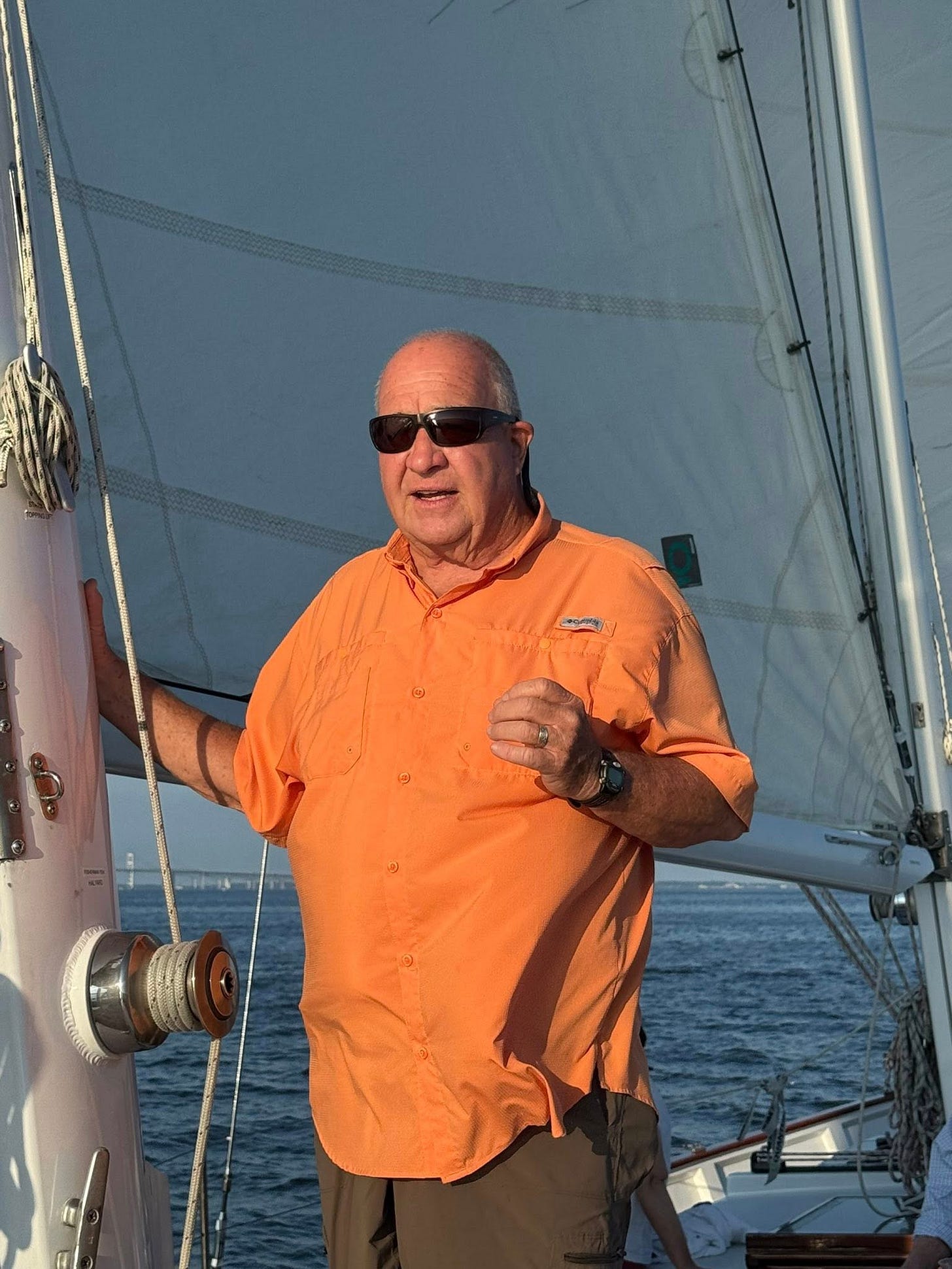 May be an image of 1 person, sailboat and sail