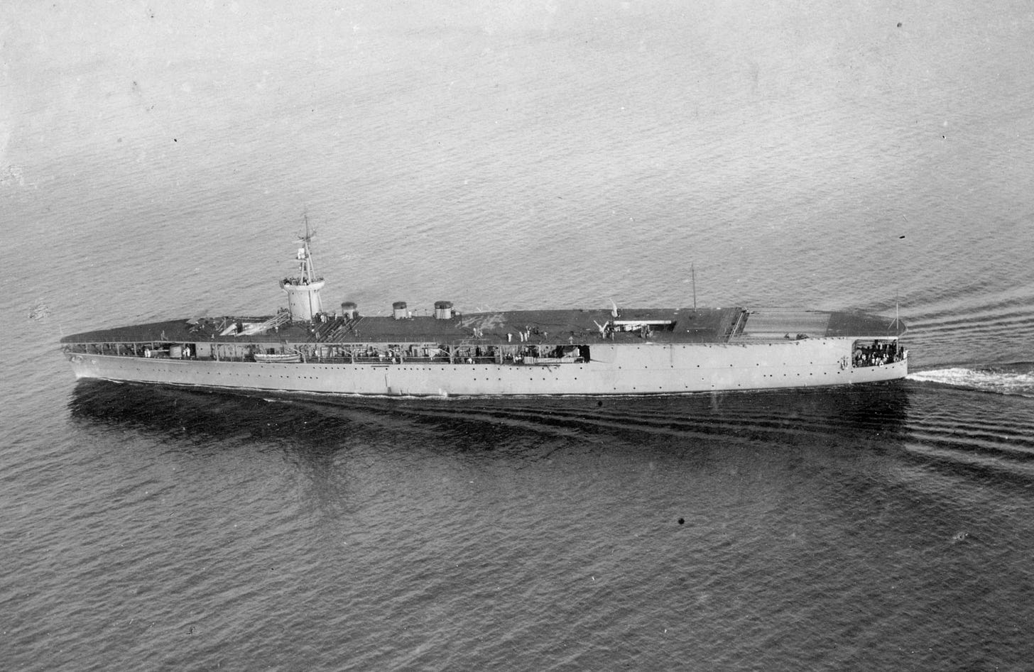 The Japanese carrier Hōshō, the world's first purpose-built aircraft carrier, proudly pictured around her commissioning in December 1922.