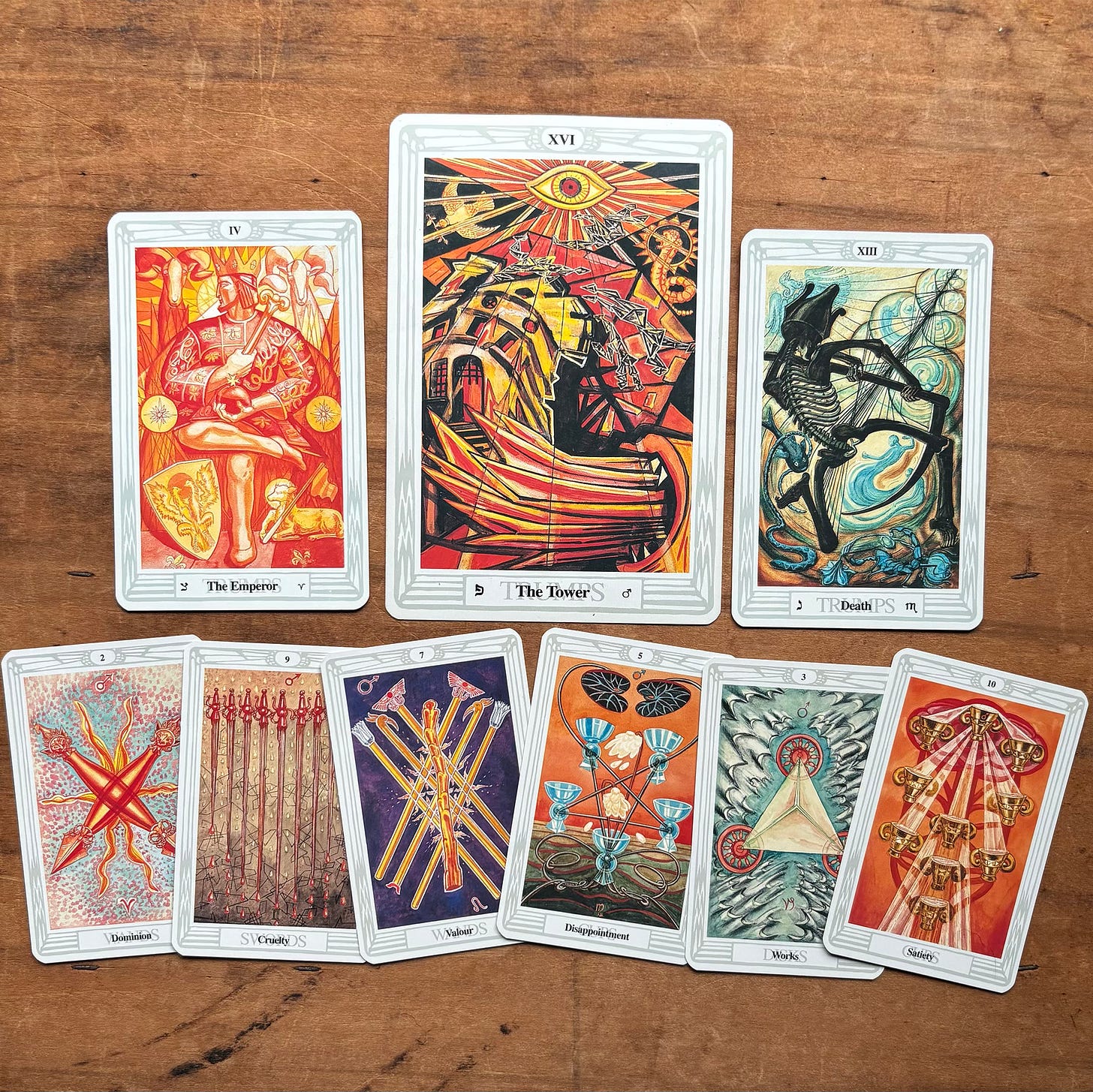 All of the tarot cards associated with Mars: The Tower, Emperor, Death, Dominion, Cruelty, Valor, Disappointment, Works, and Satiety