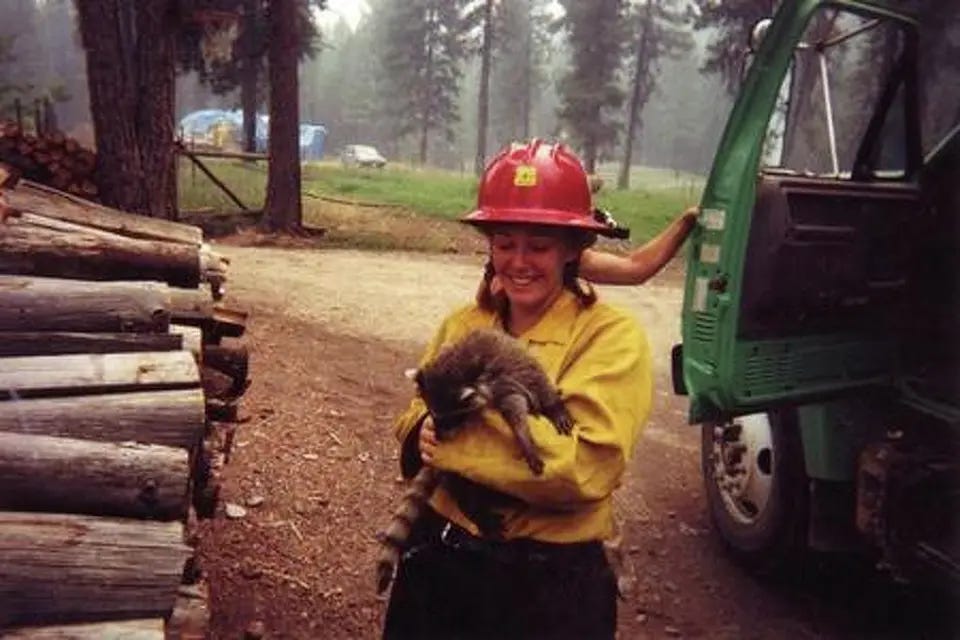 river selby hotshot author with baby raccoon montana firefigher 2003