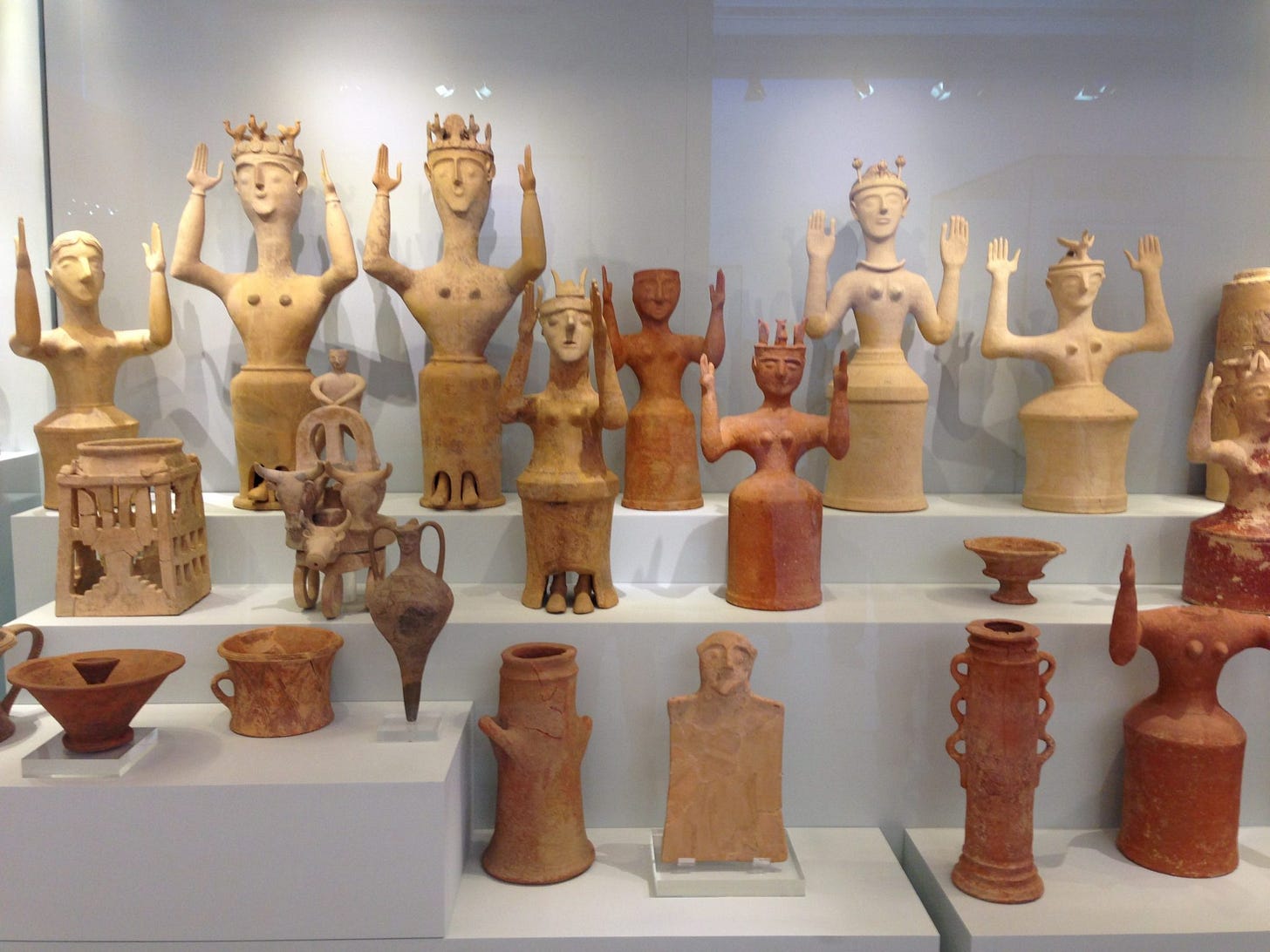 Minoan Goddesses with upraised arms Minoan Goddesses with upraised arms