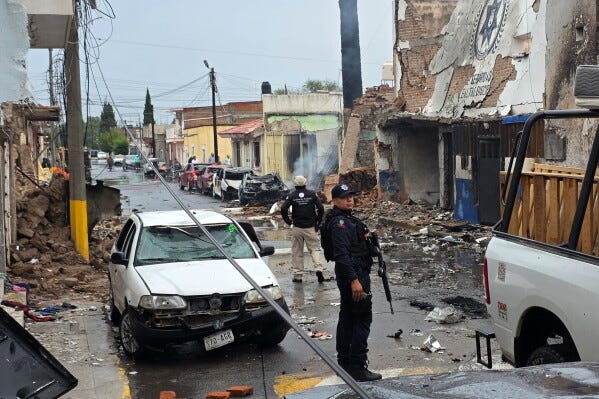 Police stand outside a municipal police station damaged after a car bomb exploded overnight in Ojocaliente, Zacatecas state, Mexico, Monday, Aug. 31, 2026. (AP Photo/Eduardo Pesci) Police stand outside a municipal police station damaged after a car bomb exploded overnight in Ojocaliente, Zacatecas state, Mexico, Monday, Aug. 31, 2026. (AP Photo/Eduardo Pesci)
