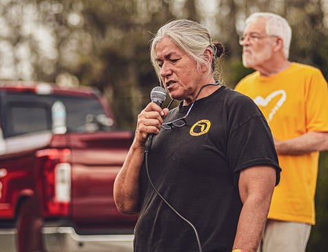 Betty Osceola and others gather to protest "Alligator Alcatraz".