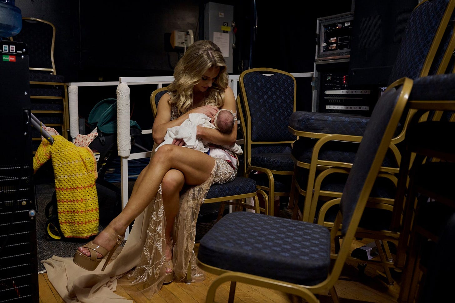 Nursing her newborn daughter Flora at Mrs World in Las Vegas in January