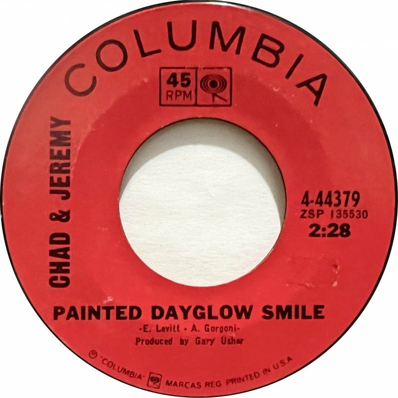 Painted Dayglo Smiles logo