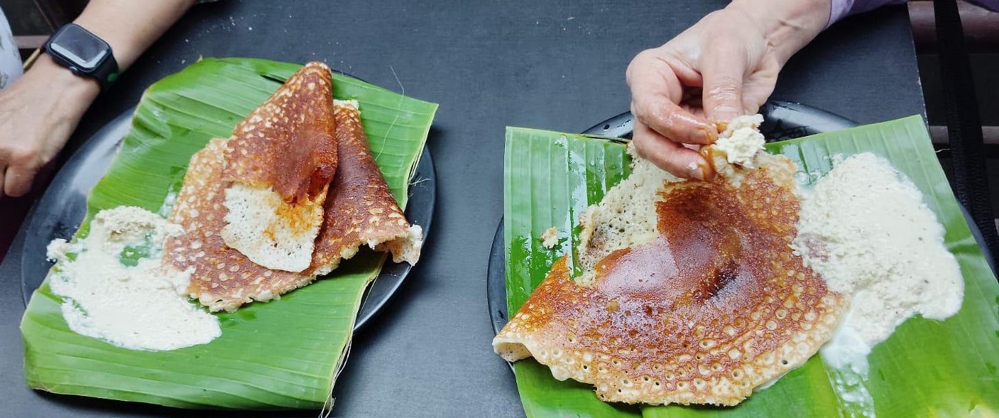 two buttery dosas shared with family two buttery dosas shared with family