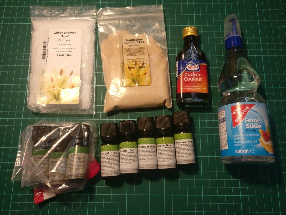 An overview of the required ingredients: Citric acid, gum arabic, caramel color, and sweetener. An overview of the required ingredients: Citric acid, gum arabic, caramel color, and sweetener.